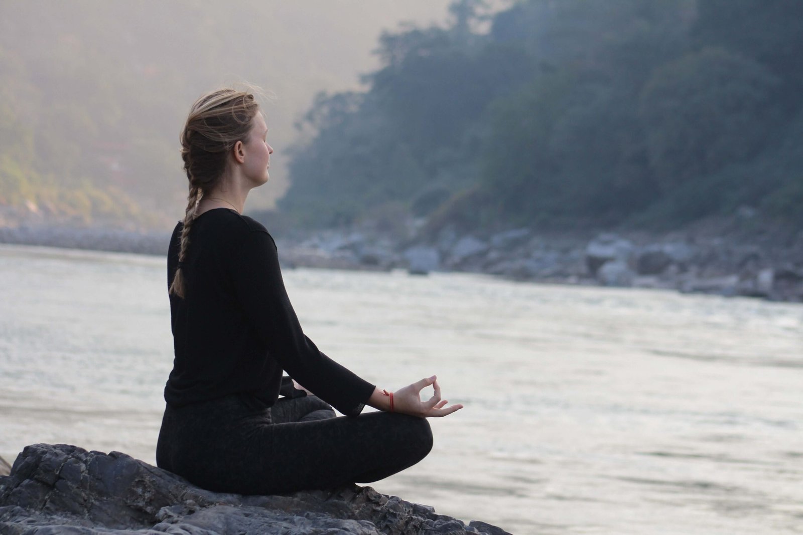 Participants in a warm indoor yoga and breathwork session during the winter seasonal retreat at The Reconnected Land