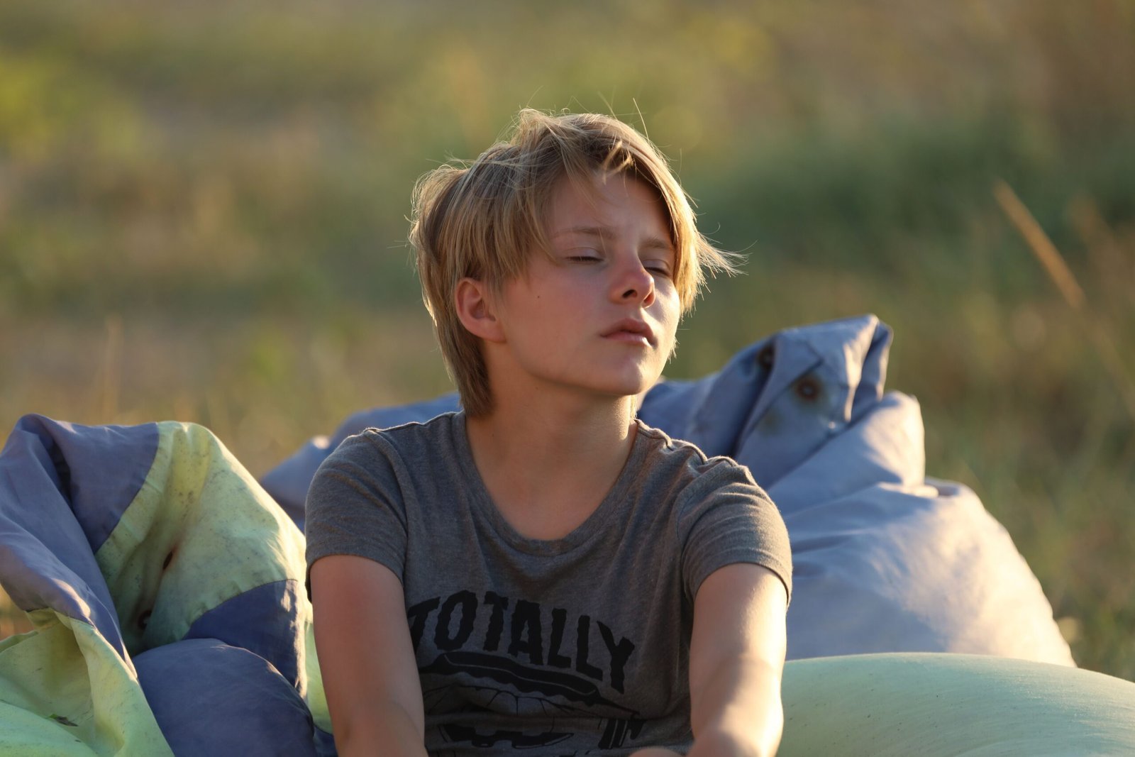 Teens practising mindfulness and movement together in a supportive group setting, cultivating resilience and self-awareness